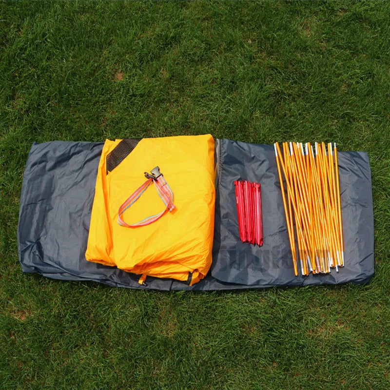 Ultralight anti-storm camping tent 2-person red double-layer with aluminium poles pitched outdoors