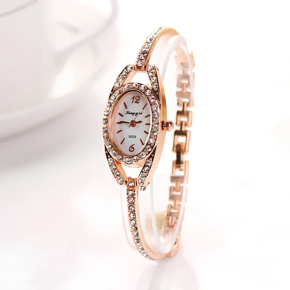 Silver-toned women's quartz bracelet watch with 25mm round dial, 185mm strap, and slim 7mm case for everyday wear