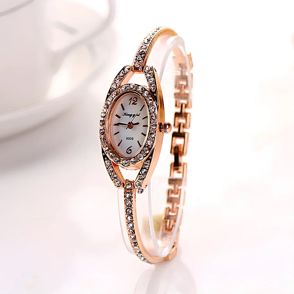 Silver-toned women's quartz bracelet watch with 25mm round dial, 185mm strap, and slim 7mm case for everyday wear