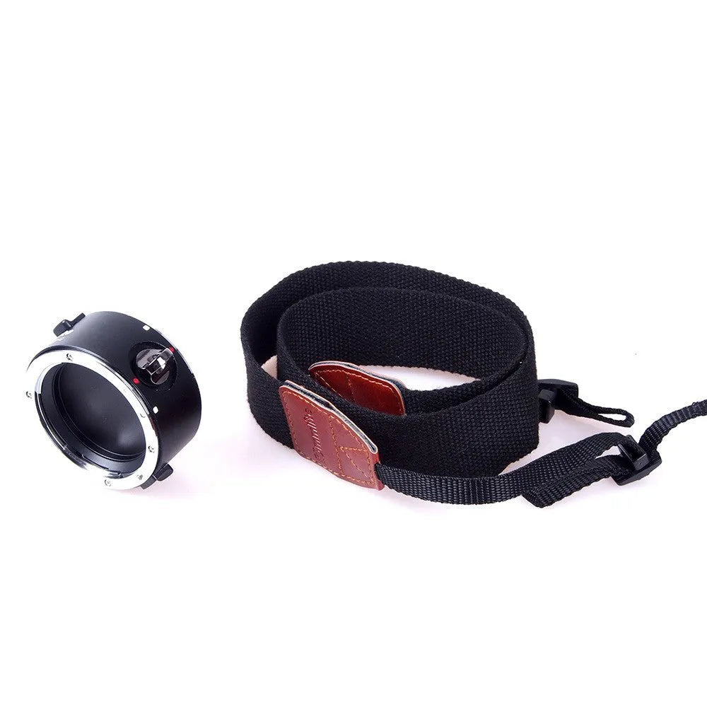 Aluminium alloy camera lens flipper dual holder with stainless steel buckle and cotton strap.
