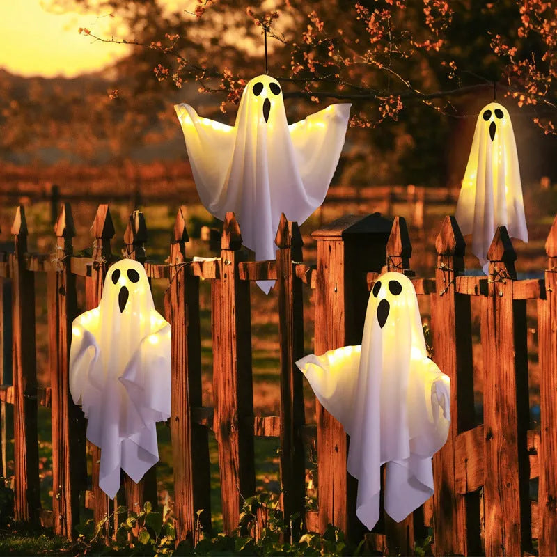 Halloween ghost light with luminous screaming ghost design in orange and white colours