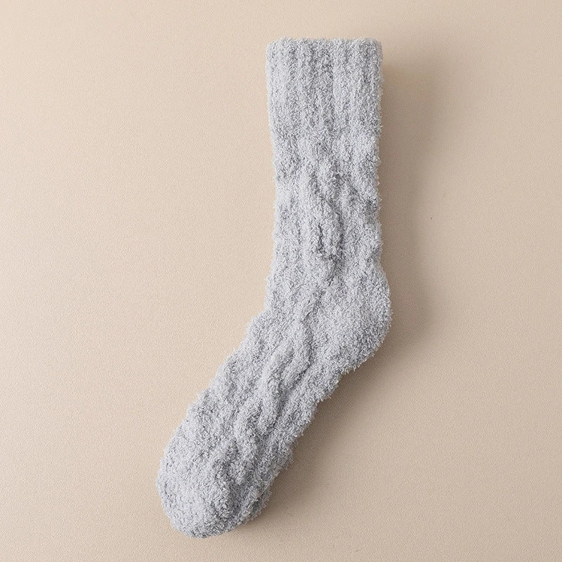 Cozy coral fleece socks in various colors, featuring soft velvet material and anti-slip design for comfort and warmth.