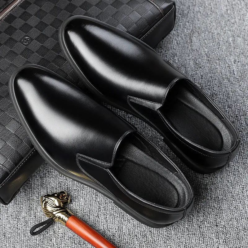 Men's black slip-on business casual loafers with leather toe cap and rubber sole