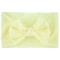 Super stretchy soft knot headband with bow for baby girls in 22 colours, made from nylon and spandex