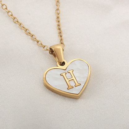 Personalized 26-letter heart-shaped necklace made of stainless steel and white shell