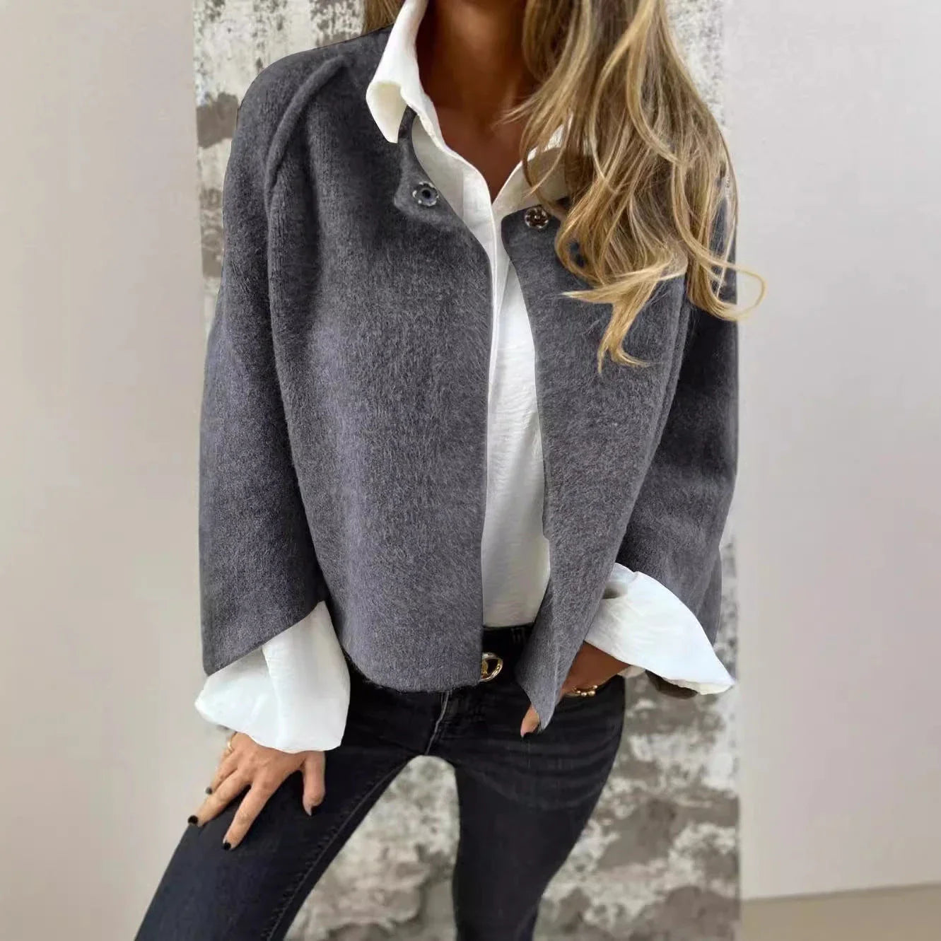 A cozy batwing sleeve cardigan made with a soft, luxurious imitation cashmere blend fabric in a variety of stylish colors.