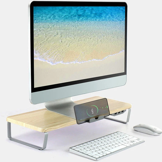 Ergonomic monitor riser with USB ports and phone holder on a desk