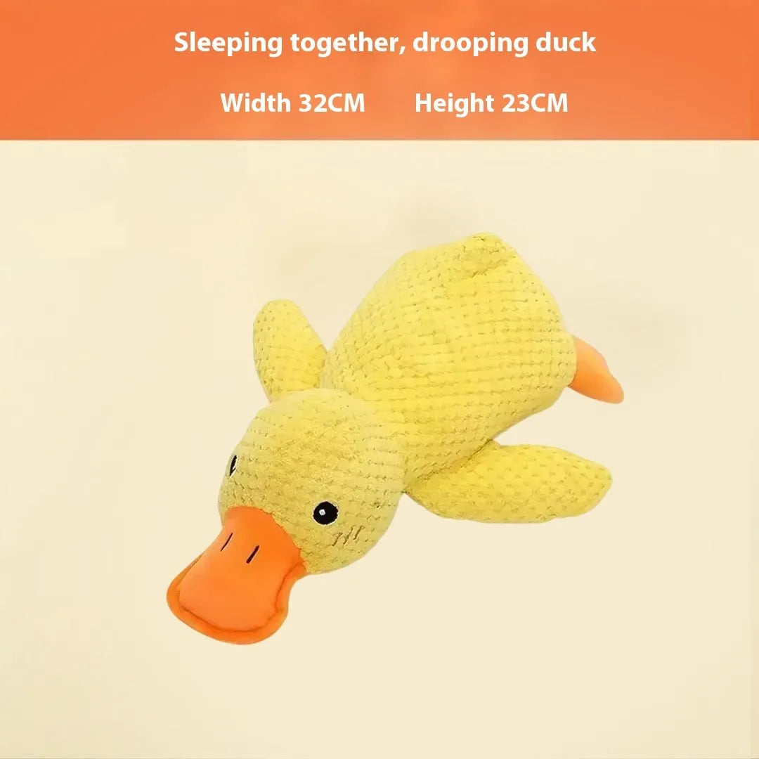 Assorted plush pet toys including a grey donkey, a beige donkey, and a yellow rechargeable duck for puppies.