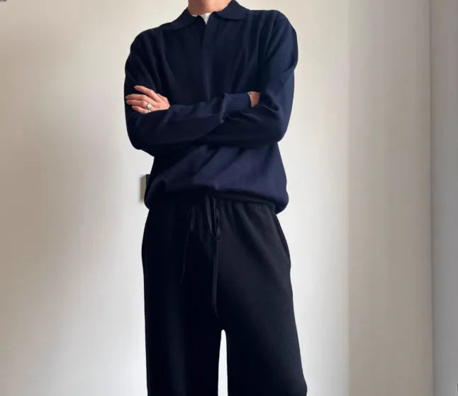 Pure wool polo sweater with a lapel collar in milky white, showing loose fit and long sleeves.