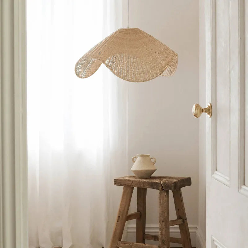 Handmade bamboo and straw rattan chandelier with warm LED light in natural woven design
