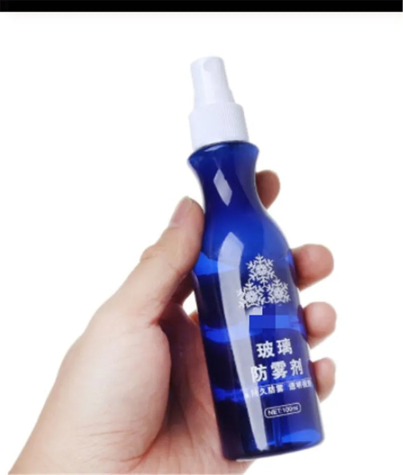 Blue bottle of windscreen liquid-spray anti-fog agent 100 ml on car dashboard