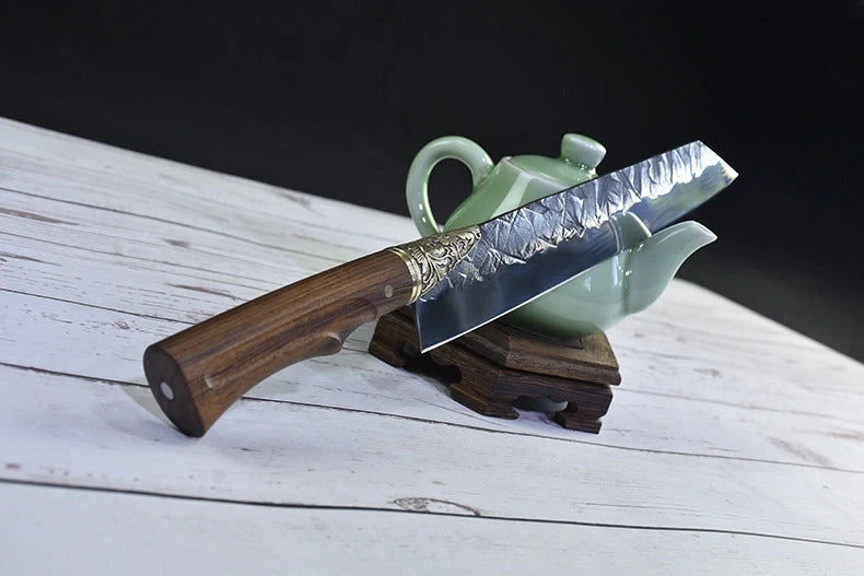 Hand-forged slicing knife with rosewood handle and leather case