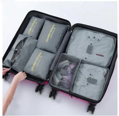 Durable waterproof packing cubes in various colors for organized, efficient travel