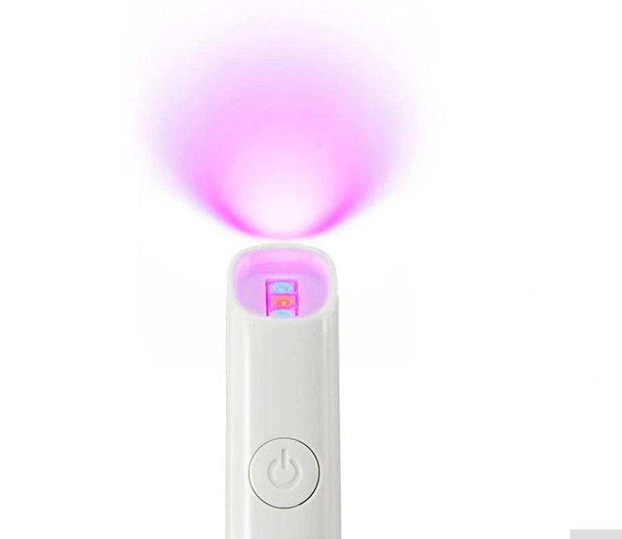Silver grey acne treatment device with red and blue light therapy, battery-powered design