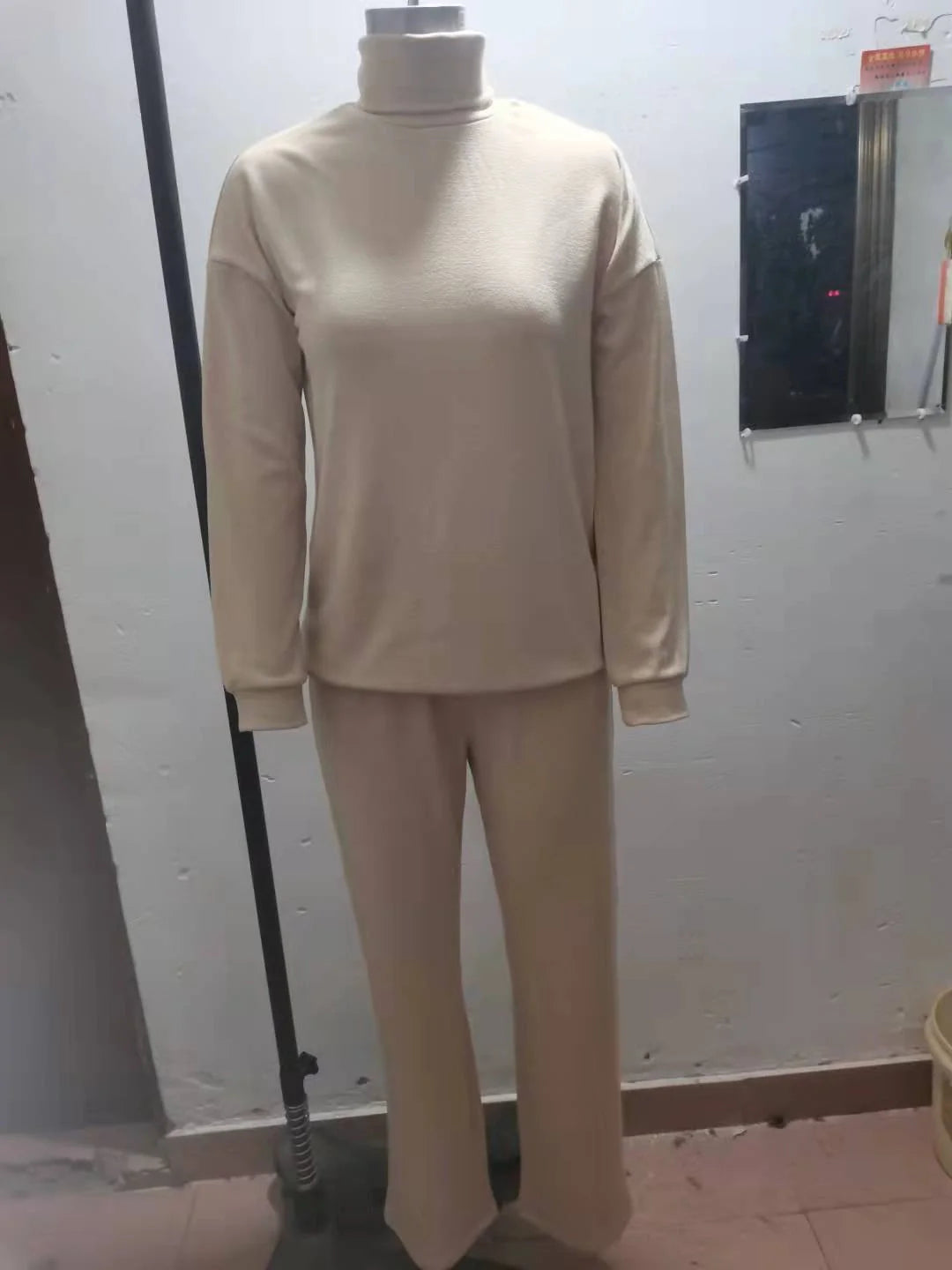 Women's casual turtleneck sweater and drawstring pants set in various colours