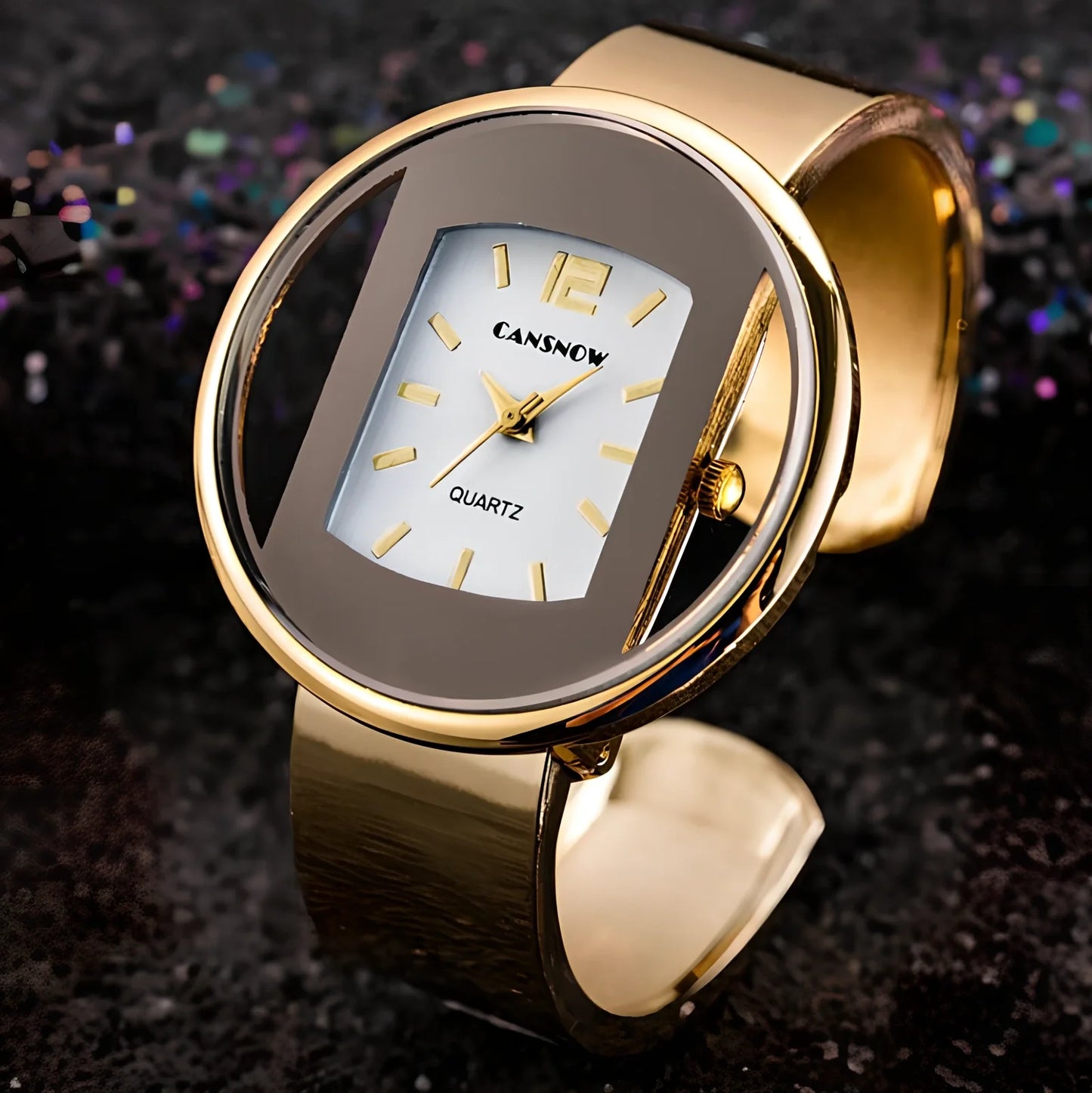 Women's gold black quartz cuff watch with 40mm dial, adjustable steel band 18mm wide, precise movement and water resistant