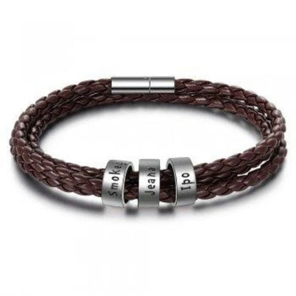 Personalized braided leather bracelet with engraved charm for men, available in black, brown, and navy colors