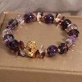 Purple crystal bracelet with pumpkin lucky beads and rhinestone wind chimes design for women.