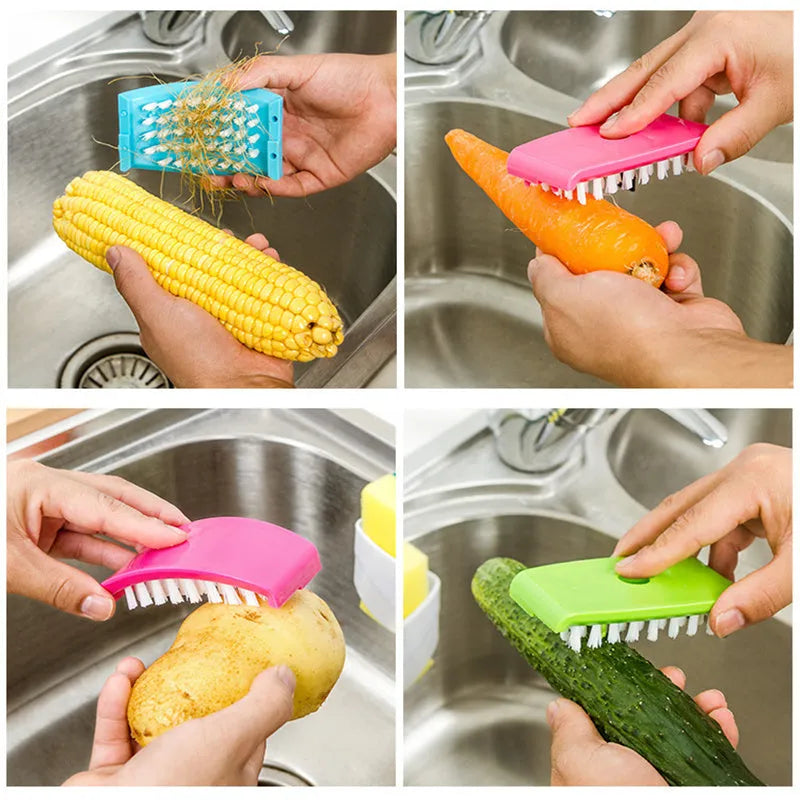 Blue kitchen cleaning brush with suction cup base for washing fruit, vegetables and cutlery.
