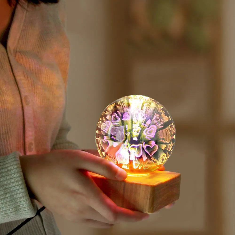 Spherical USB touch control LED night light showing starry sky pattern on a desk.