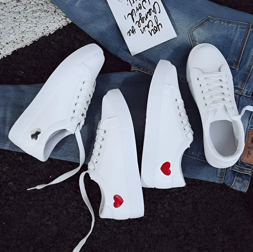 Women's PU leather heart pattern flat shoes in white red colour with non-slip rubber sole