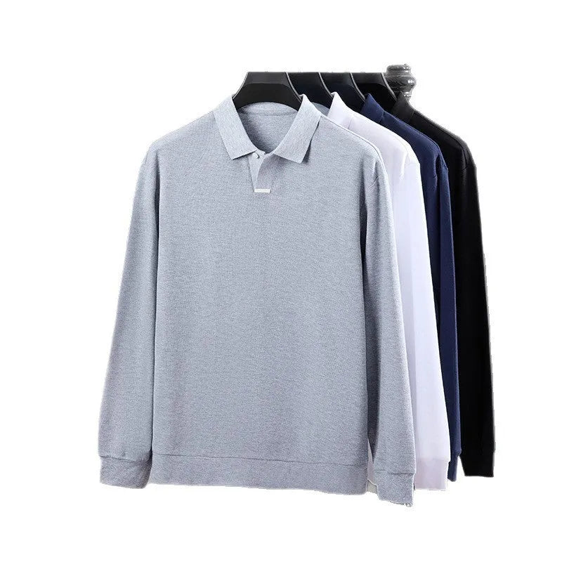 Man wearing a gray loose-fit long sleeve cotton polo shirt with lapel collar.