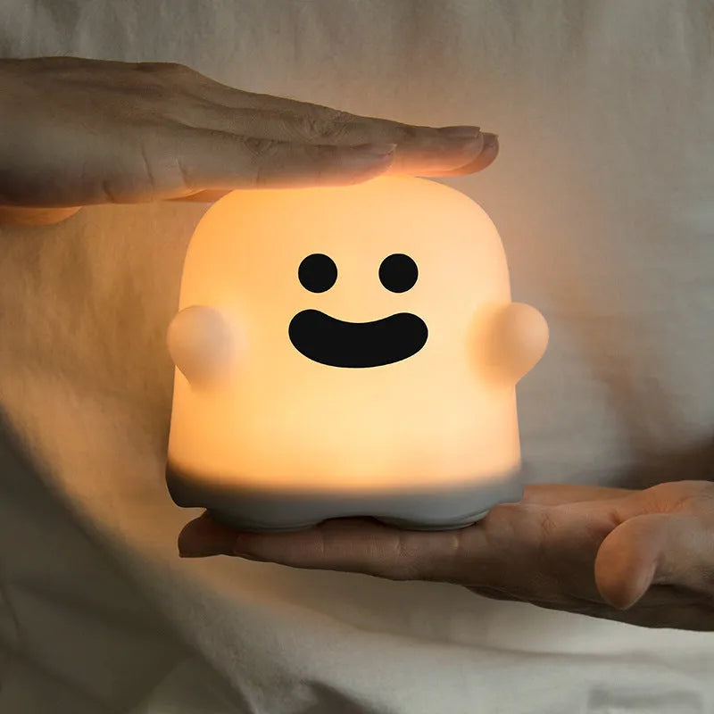 Silicone touch sensor night light showing soft glow illumination and compact design