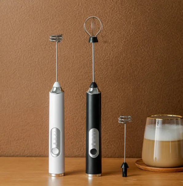 Electric coffee frother in Phantom Night Black with two frothing heads and cordless handheld design