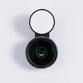 External smartphone camera lens with wide-angle capability and colourful LED lights attached to mobile phone