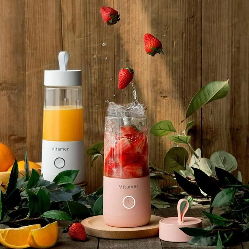 White portable USB rechargeable blender bottle with silicone handle and stainless steel blade.