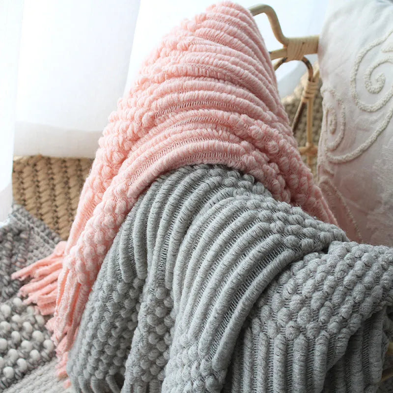 Nordic knitted bubble blanket in light grey on a modern sofa, 127x170cm polyester acrylic throw