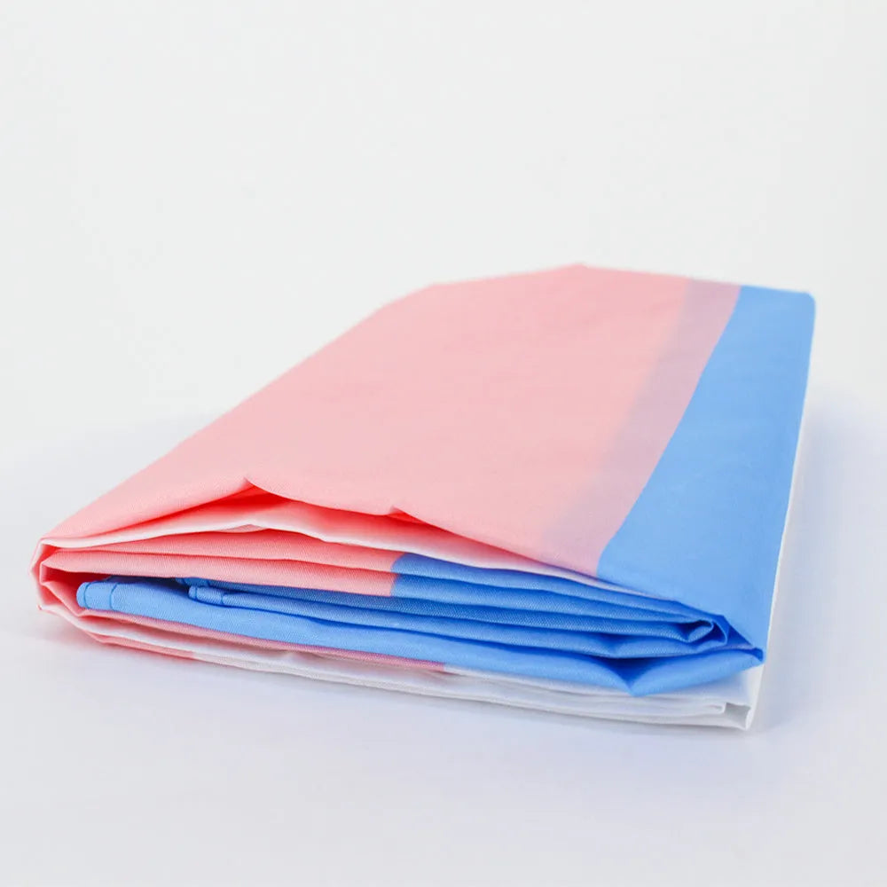 Transgender rainbow pride flag in polyester fibre, 90x150cm, displayed outdoors on a pole