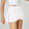 Women's solid colour quick-drying nylon sports shorts shown in multiple colour options.
