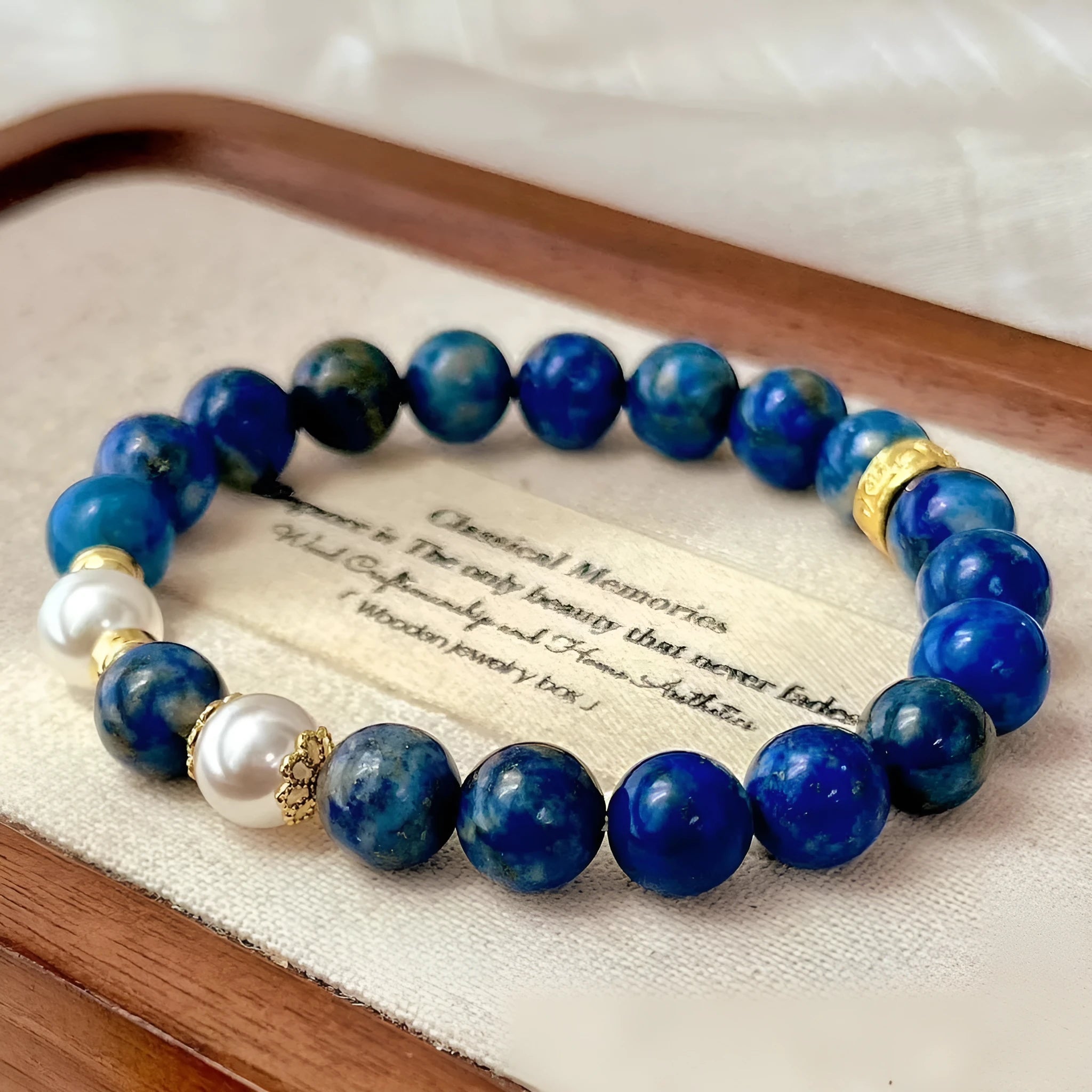 Lapis lazuli green gold stone bracelet with Chinese retro artistic design on wrist