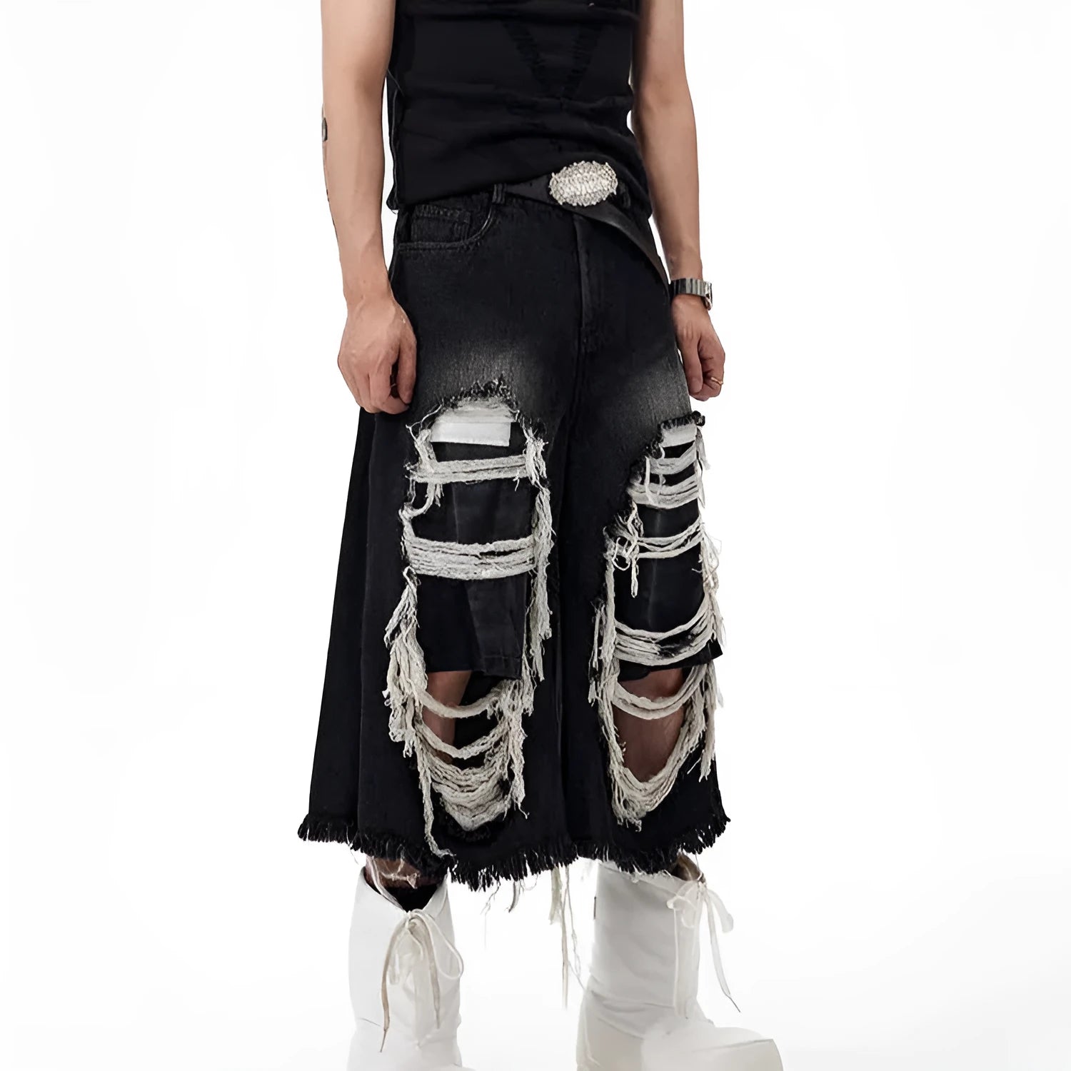 Black wide-leg cropped jeans with a ripped patch detail on the leg, showing a mid-high waist and loose fit.