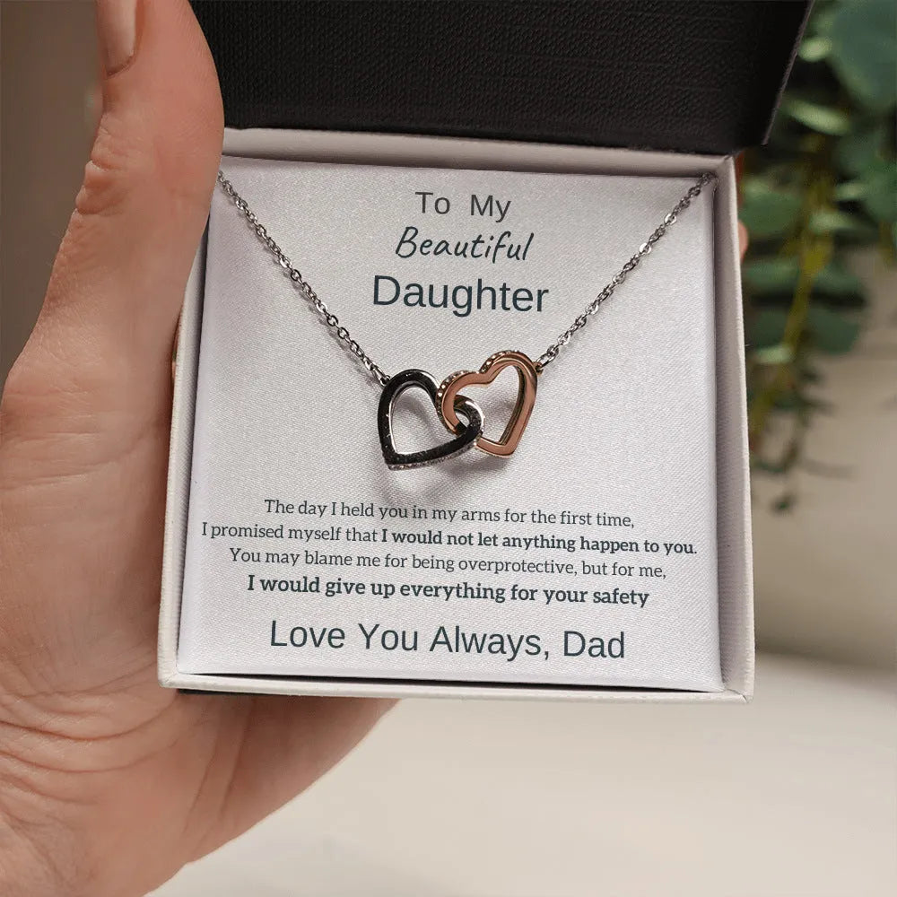 Double heart copper pendant with two-colour peach finish on white background