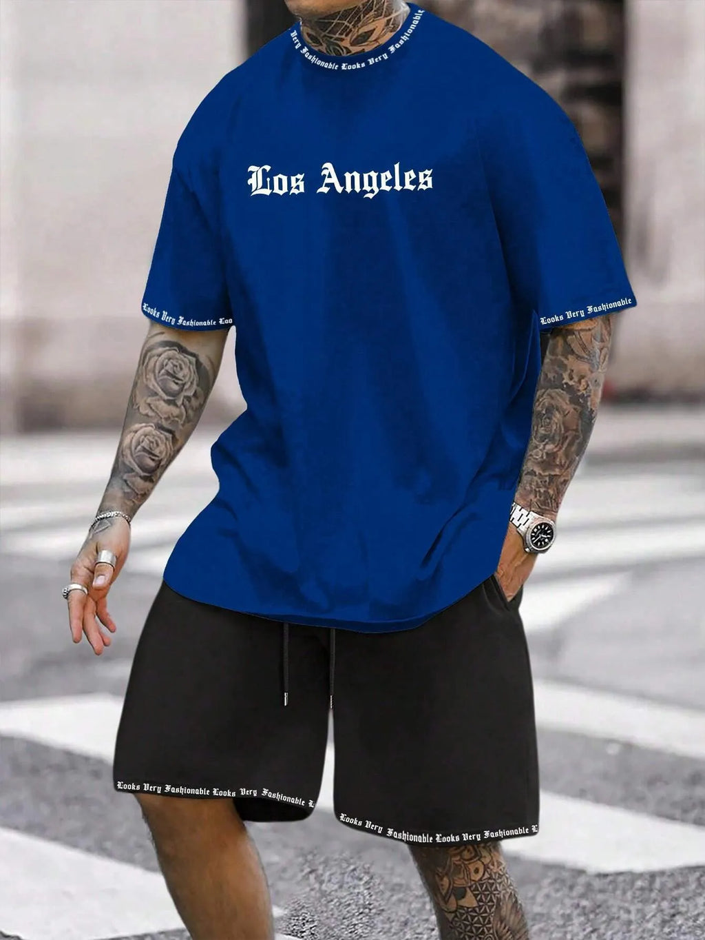 Men's sports style short-sleeved suit set with matching shorts in polyester blend fabric