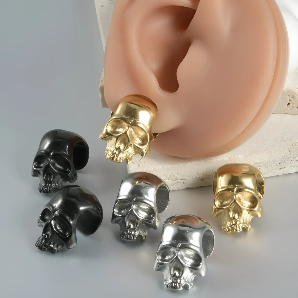 Stainless steel hollow skull and Buddha head geometric ear cuff for hip hop style.