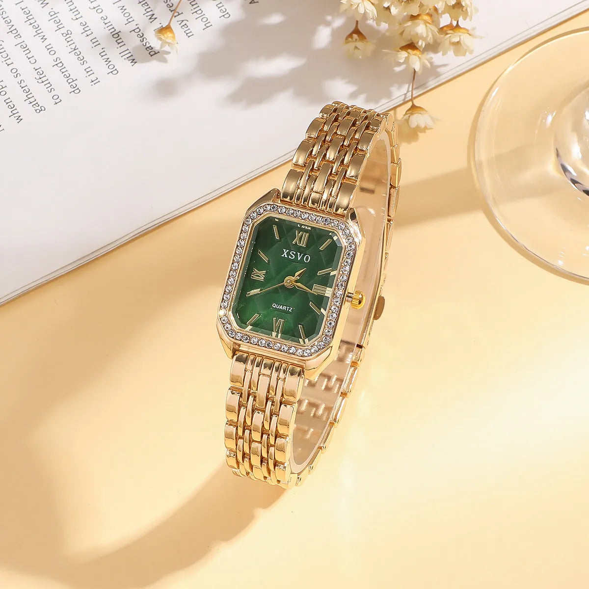 Gold green women's square watch with four matching bracelets showing 25mm dial and jewellery buckle