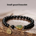Black obsidian and white Hetian jade gourd bracelet with geometric pattern in 6mm, 8mm, and 10mm size options.