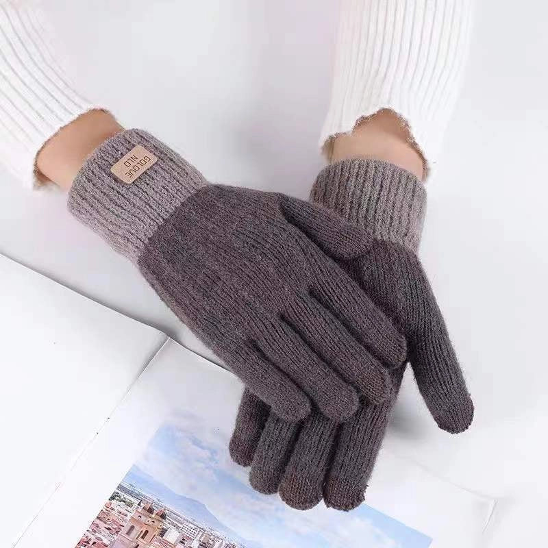 Winter mittens with embroidered stripes in various colours for warmth and style