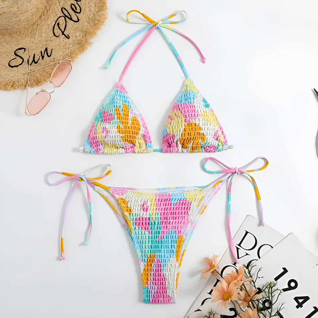 Women's triangle bikini swimsuit with floral gradient pattern and smocking craft detailing