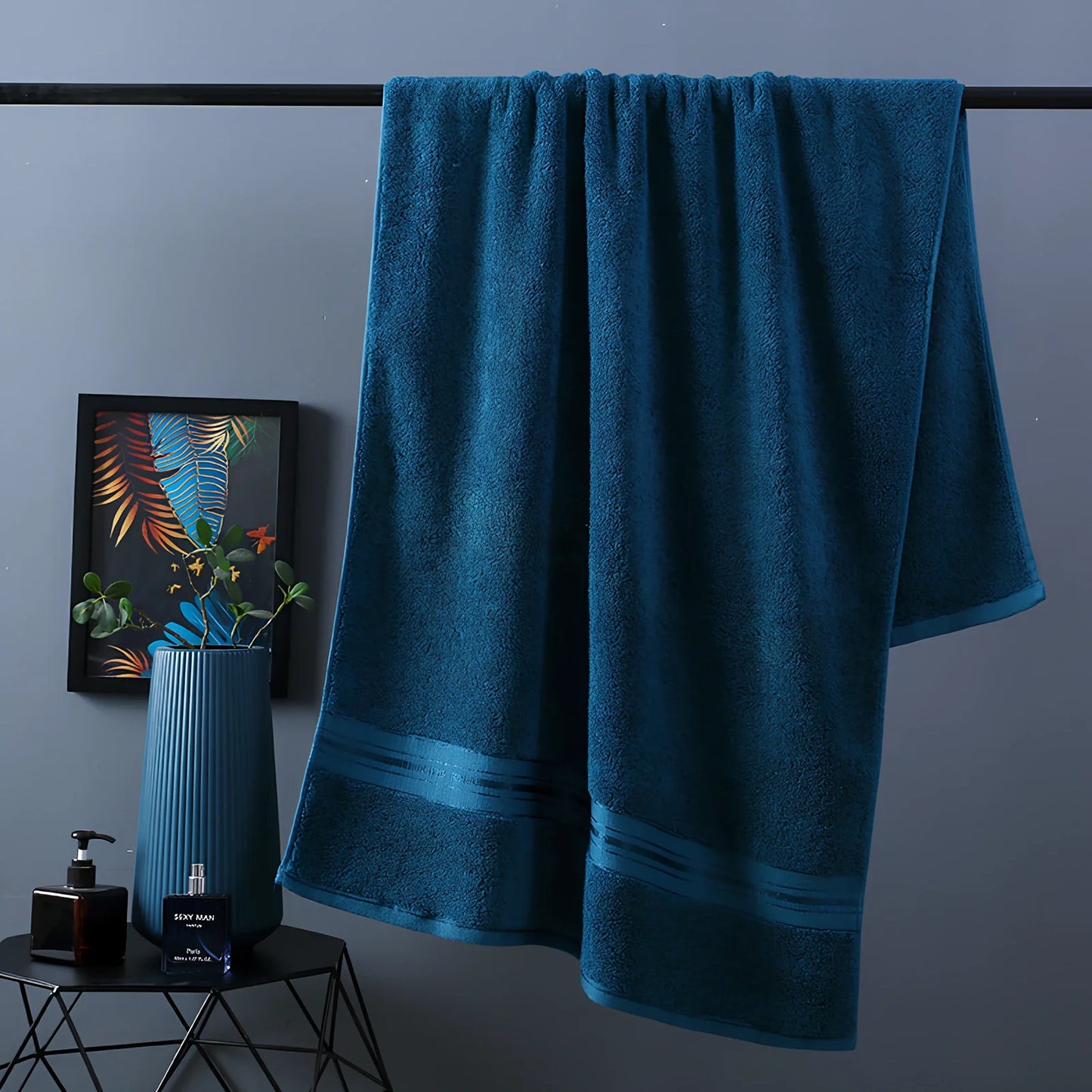 Three-piece cotton bath towel set in blue, featuring 70x150cm bath towel, 34x75cm hand towel, and 34x35cm square scarf for absorbent drying