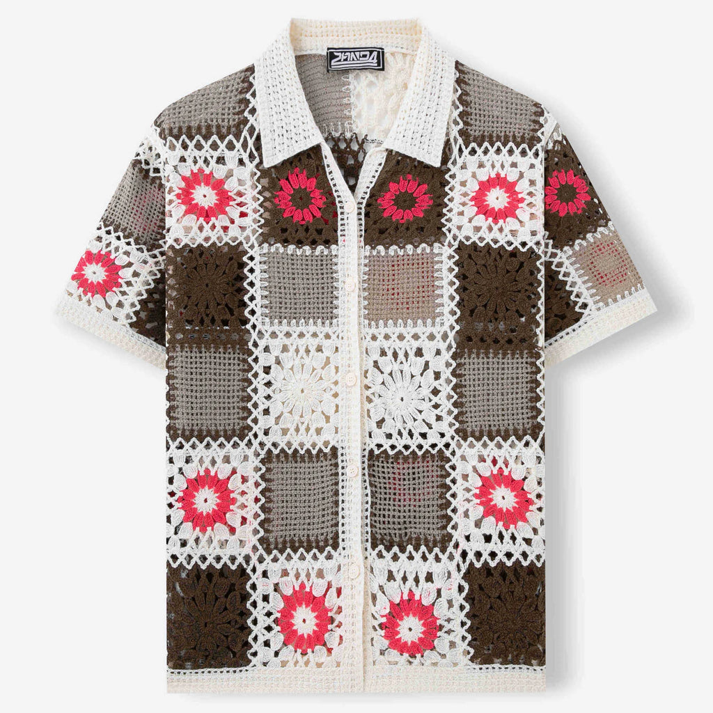 White crocheted short sleeve sweater dress with hollow bandage pattern and flocking detail.