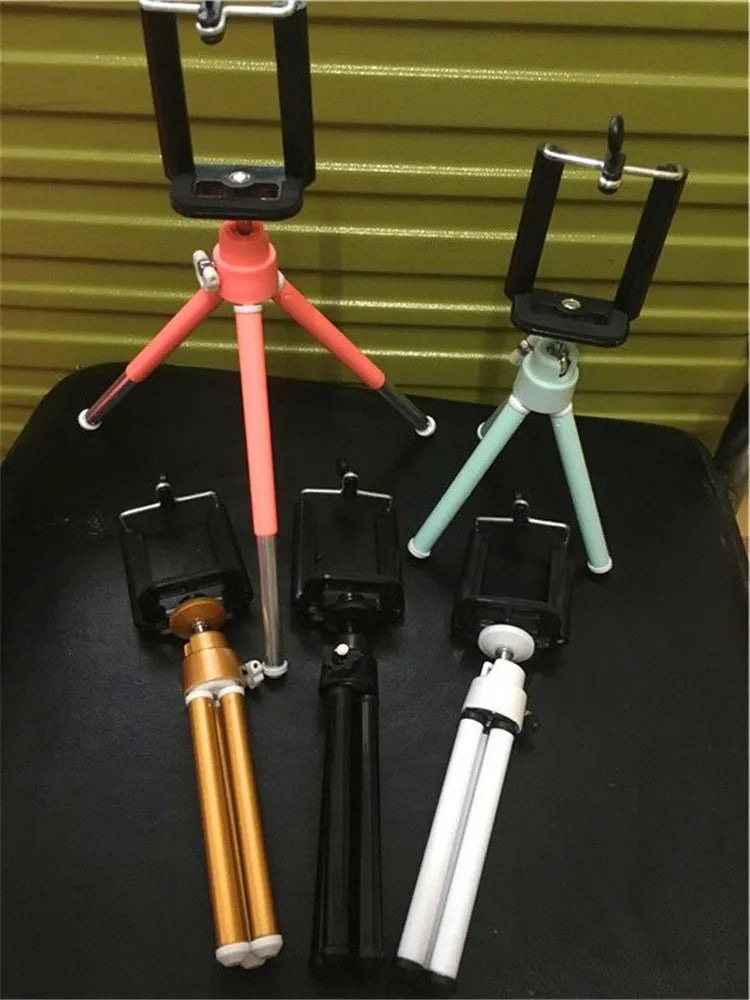 Desktop phone holder with two-section adjustable bracket and weighted base in black colour