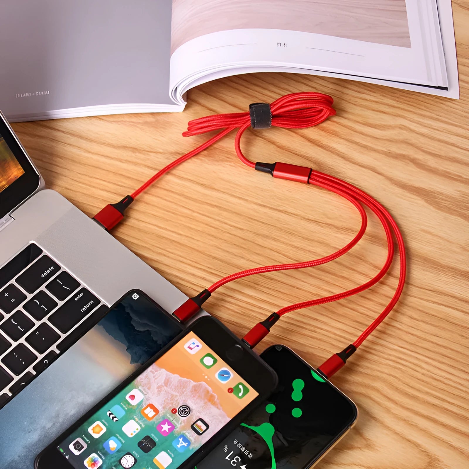 Red nylon woven three-in-one data cable with Lightning, Micro USB, and Type-C connectors on white background