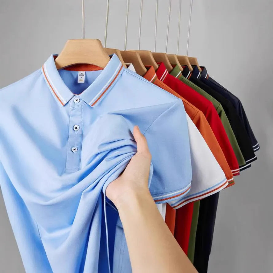 Men's slim fit cotton blend polo shirt on a hanger, showing collar and short sleeves.