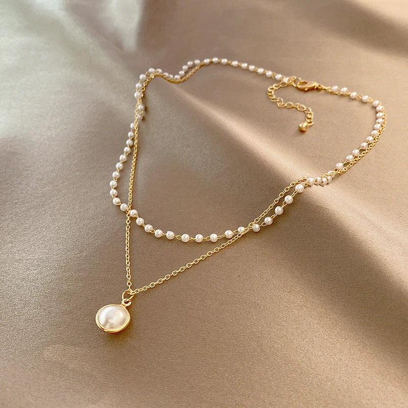 Double-layer pearls necklace with adjustable chains for summer wear