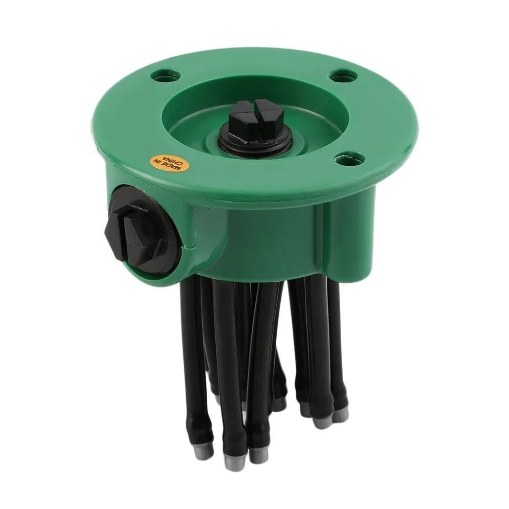 Green adjustable lawn sprinkler with flexible bendable watering nozzles on a 9cm base.