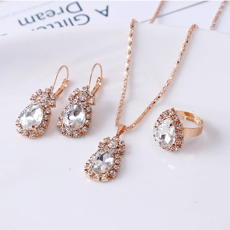Water drop rhinestone jewellery set with adjustable necklace, earrings, and ring in various colours